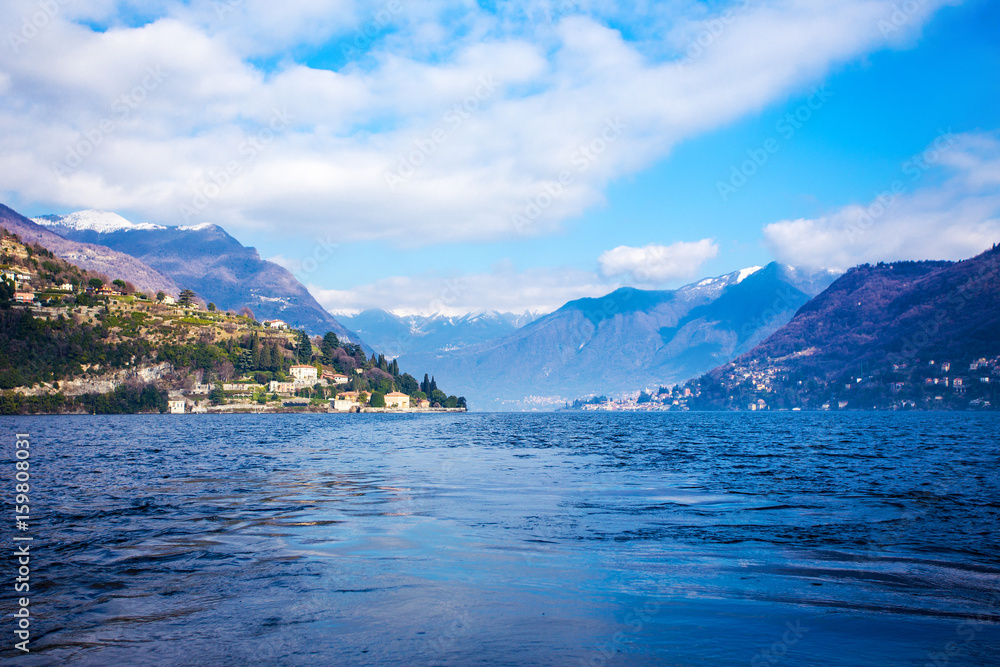 Beautiful Italy - blue sky, mountains and Como Lake