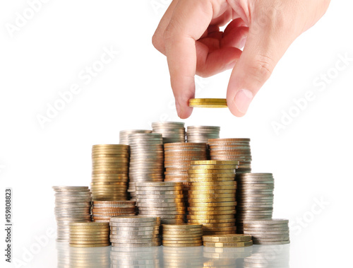 human hand putting coin to money