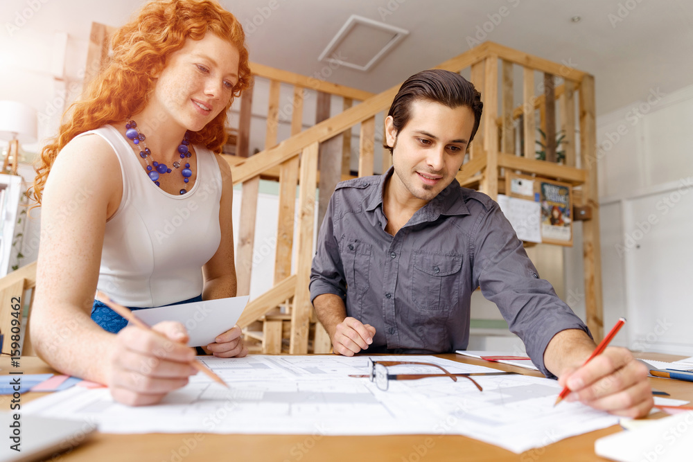 Two young architects in office Two young architects in office