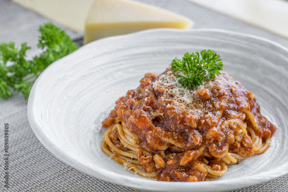 Spaghetti bolognese with cheese and pasley Spaghetti bolognese with cheese and pasley