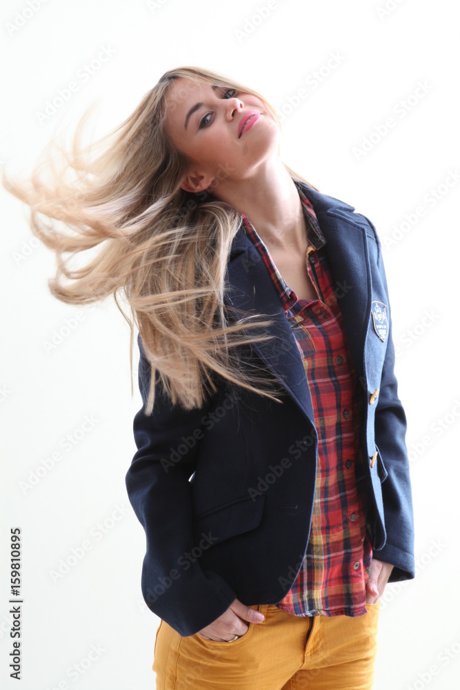Beautiful young woman, with long blond hair and blue eyes. Young pretty woman, with school uniform Beautiful young woman, with long blond hair and blue eyes. Young pretty woman, with school uniform