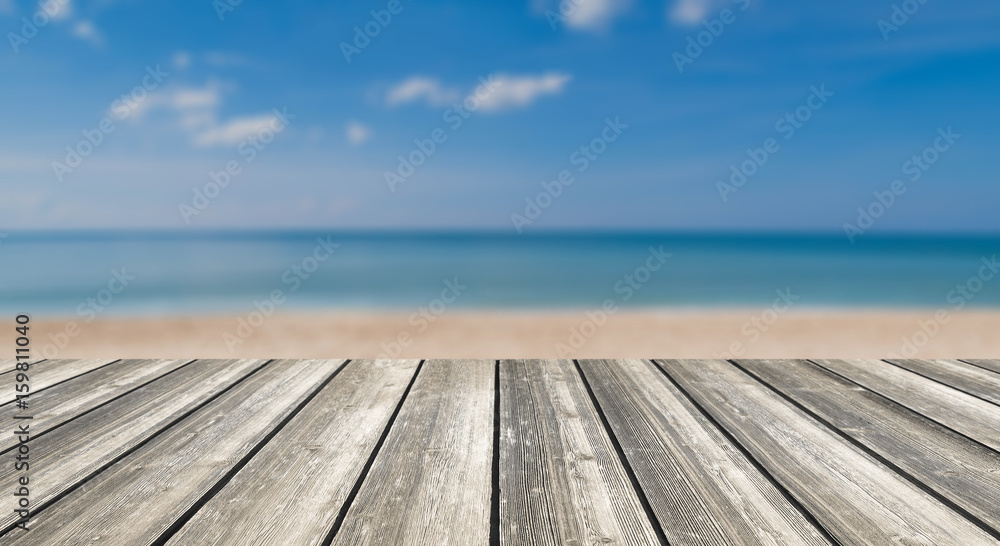 Wood table top and blurred summer blue sea and sky background. - can used for display or montage your products. Wood table top and blurred summer blue sea and sky background. - can used for display or montage your products.