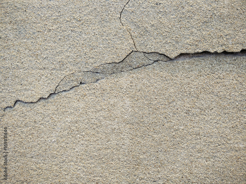 Obraz premium Old wall with large cracks and texture background