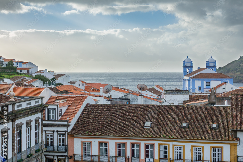 Church, roofs and ocean in Angra do Heroismo, Island of Terceira, Azores