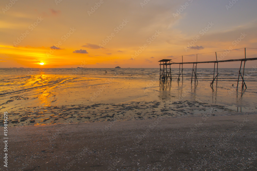 Scenery of sunset captured at Pantai Remis, Selangor, Malaysia. The motion of cloud and water is due to long exposure effect. Low light Scenery of sunset captured at Pantai Remis, Selangor, Malaysia. The motion of cloud and water is due to long exposure effect. Low light
