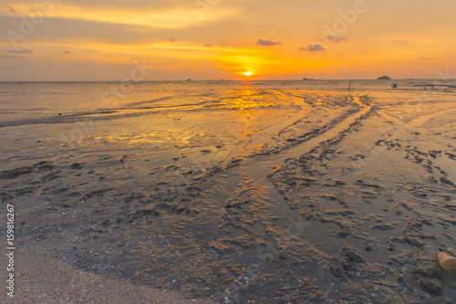 Scenery of sunset captured at Pantai Remis  Selangor  Malaysia. The motion of cloud and water is due to long exposure effect. Low light