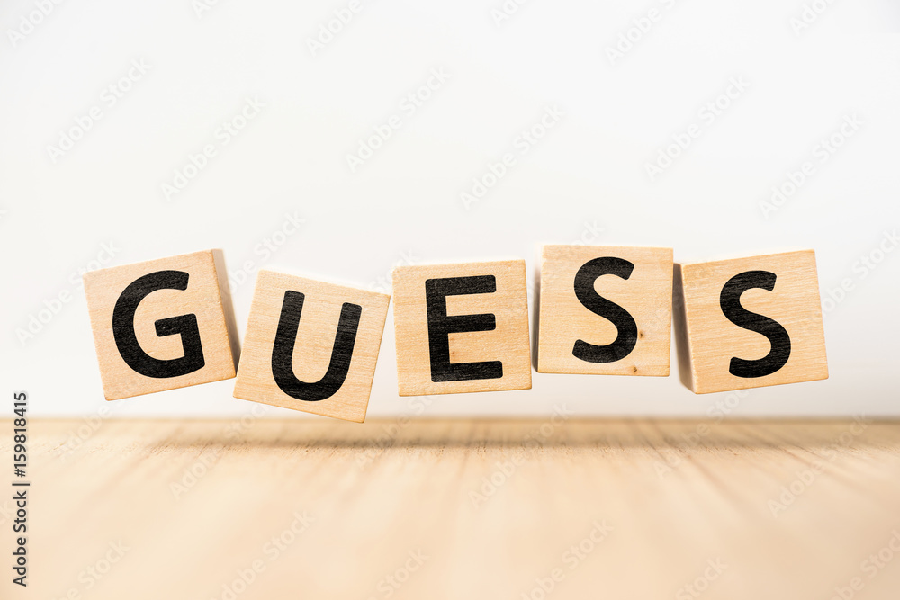 Surreal abstract geometric floating wooden cube with word "GUESS" concept  float on wood floor white background. Stock Photo | Adobe Stock