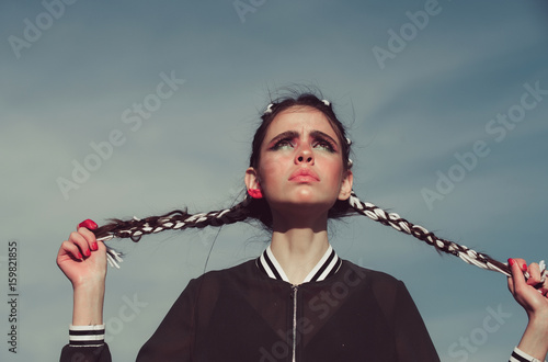 fashionable girl, woman with long indie hairstyle photo