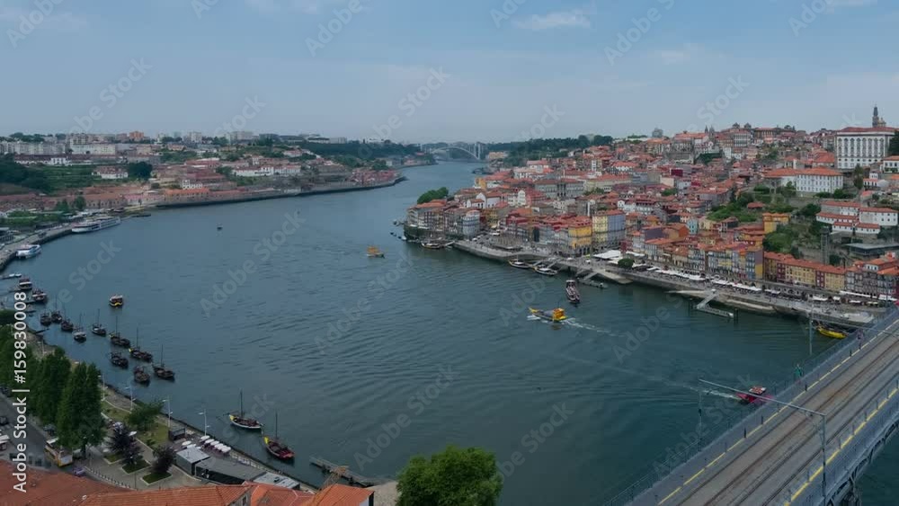 Zoom out timelaps of Porto and Douro river in a summer day