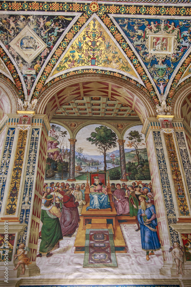 Fresco painted by Umbrian Bernardino di Betto, called Pinturicchio, probably based on designs by Raphael in Piccolomini Library, Cathedral in Siena