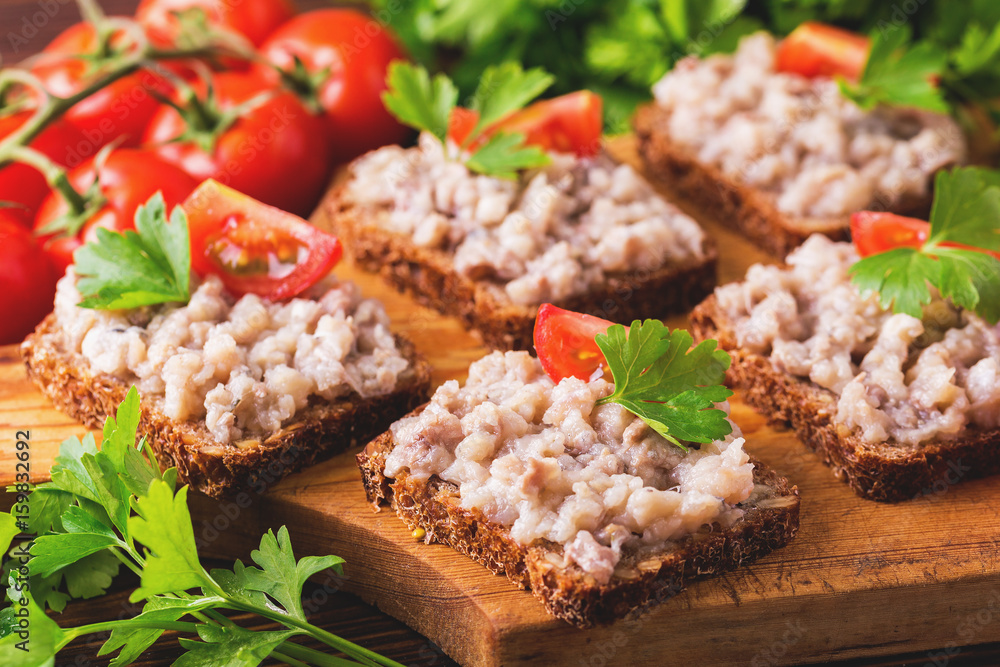 Toast with kosher Forshmak paste, parsley and cherry tomatoes Toast with kosher Forshmak paste, parsley and cherry tomatoes