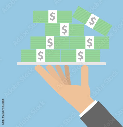 Hand holding a big pile of cash on a silver platter