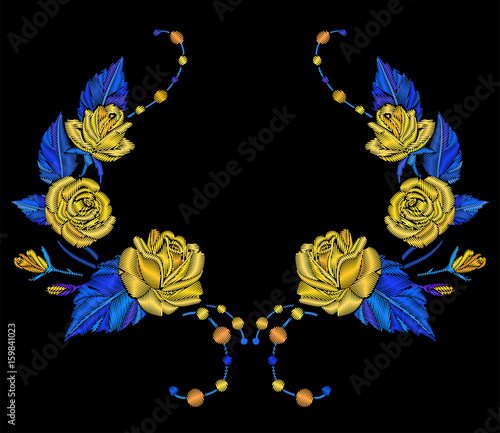 Embroidery yellow roses symmetrical ornament for decoration of clothes.
