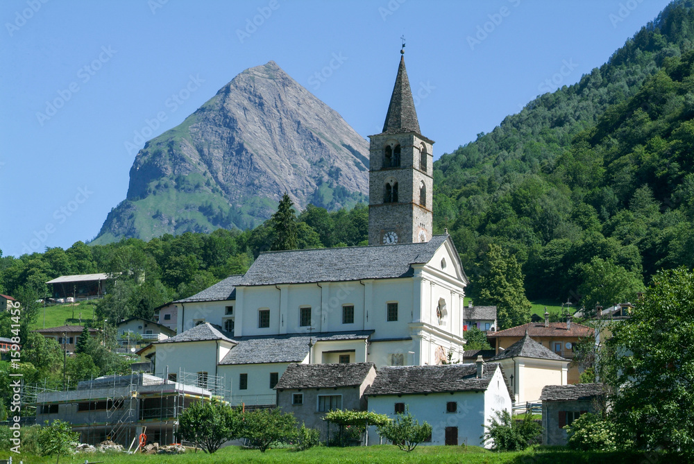 Church at the village of Aquila on the Swiss alps