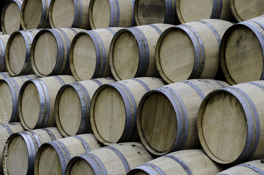 wooden barrels at the distiiery