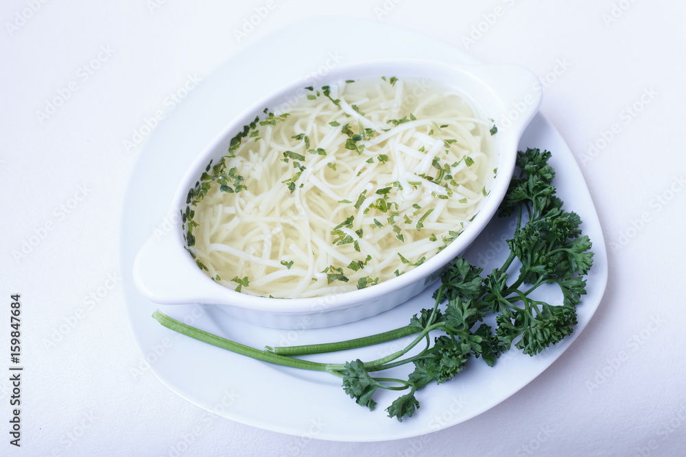 Delicious wedding soup in a white plate from above isolated Delicious wedding soup in a white plate from above isolated