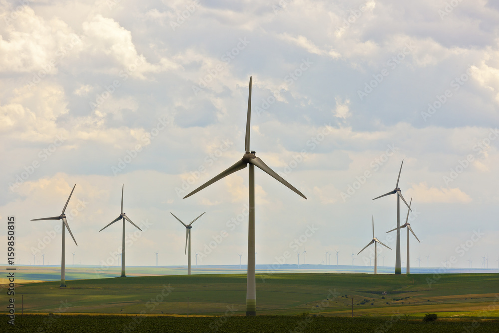 Landscape with an agricultural and wind farm in Romania Landscape with an agricultural and wind farm in Romania