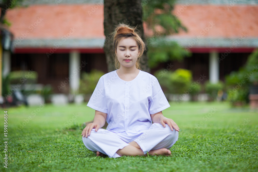 Buddhist Nuns meditation on the temple of thailand Buddhist Nuns meditation on the temple of thailand