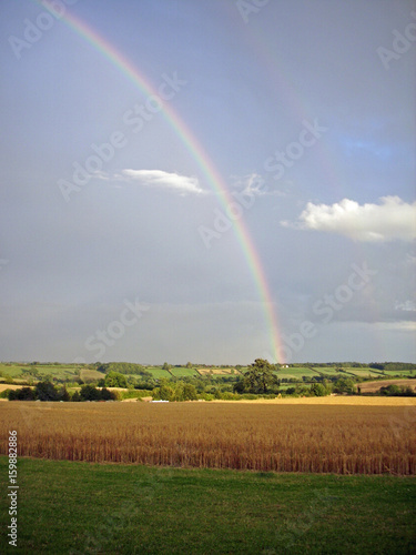 Rainbow over farmland