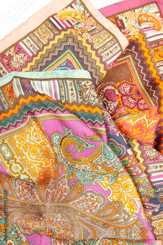 Still life of colorful scarves, draped on table, isolated neckerchief, Women Accessories
