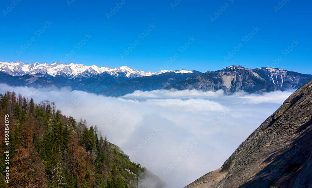 View over the mountain landscape and over the clouds - Moro Rock, Sequoia National Park, California, USA