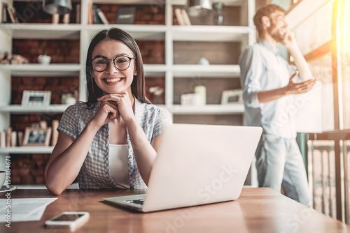 Couple working in cafe