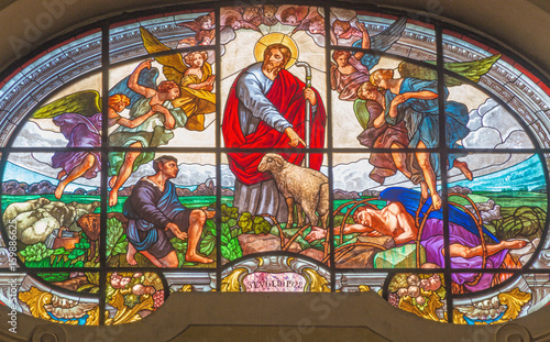Tablou pe pânză TURIN, ITALY - MARCH 13, 2017: The stained glass of Good Shepherd in Church Chiesa di Santo Tommaso by unknown artist from year 1928