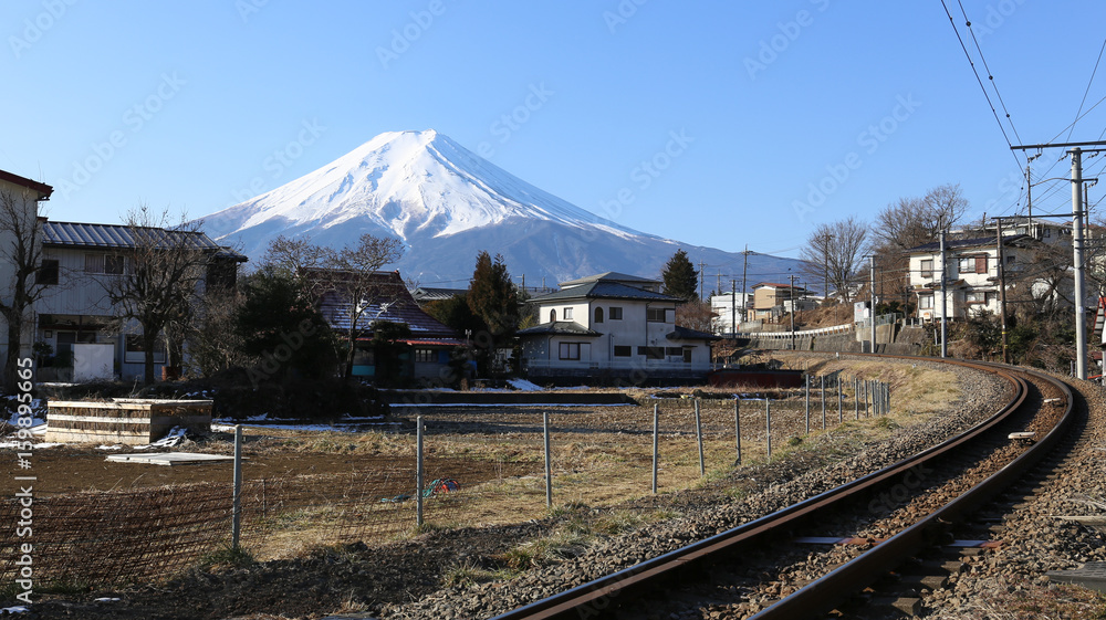 Fuji mountain and Fujikyo Otsuki line railway in the morning