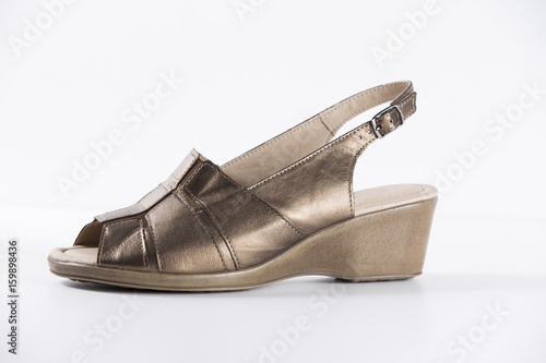 Female Color Bronze Sandal on White Background, Isolated Product, Top View, Studio.