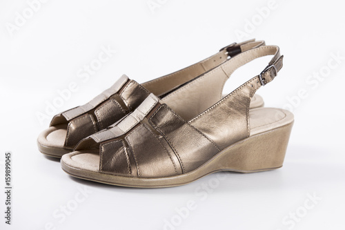 Female Color Bronze Sandal on White Background, Isolated Product, Top View, Studio.