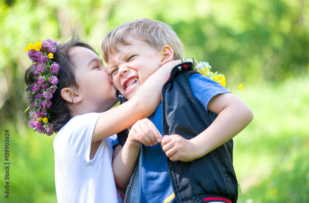 little girl kissing a little boy little girl kissing a little boy