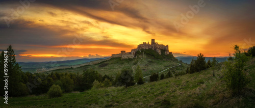 Dramatic sunset over the ruins of Spis Castle in Slovakia