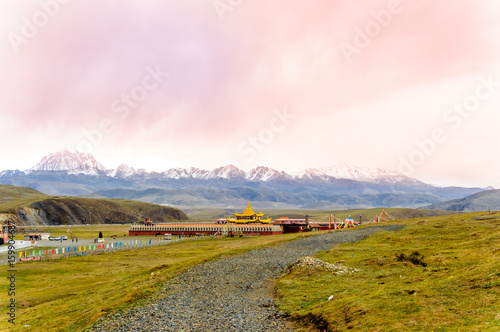 View on golden Muya Pagode by Tagong grassland in Sichuan photo