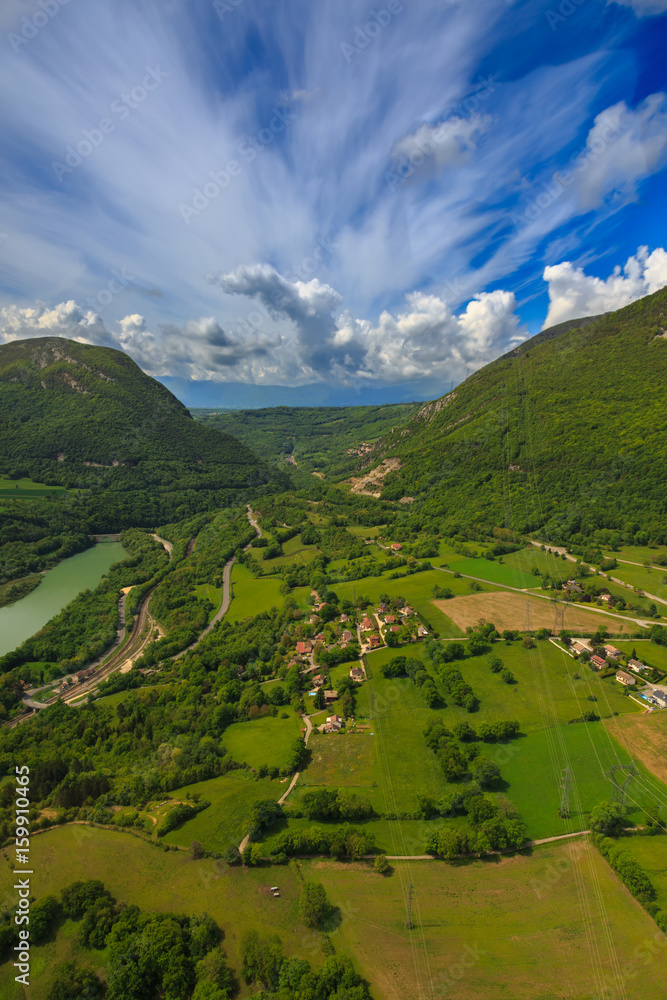 Landscape mountains, village houses. A view of the earth from the sky. Shooting with copter. France. Nature in summer