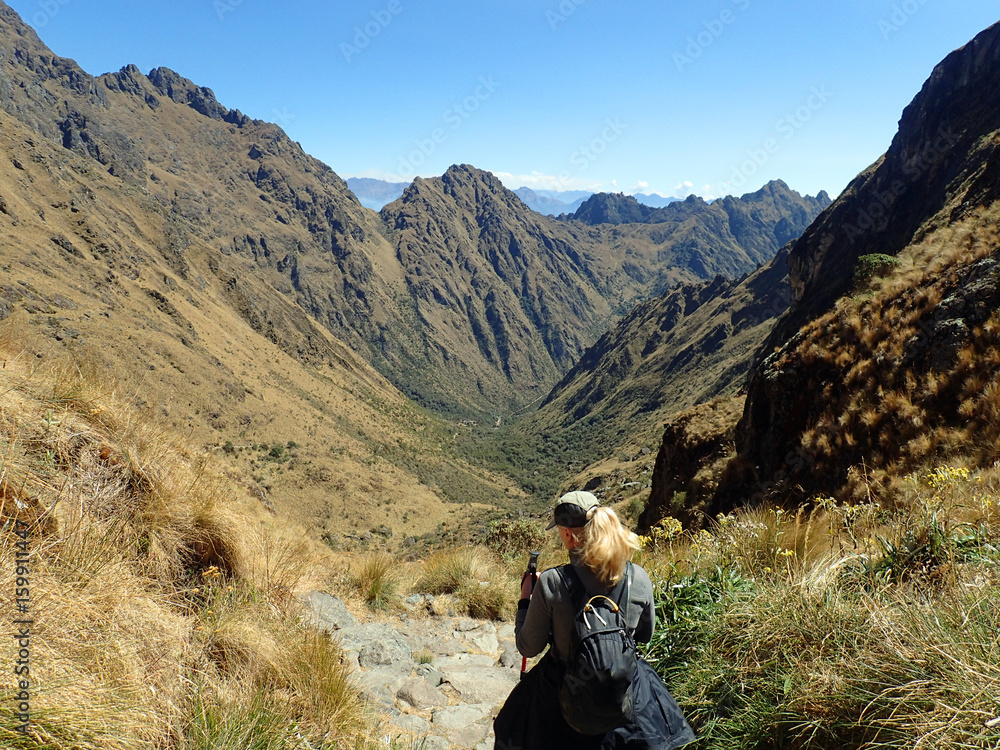 Woman hiking in the Inca trail, Machu Pichhu, Peru