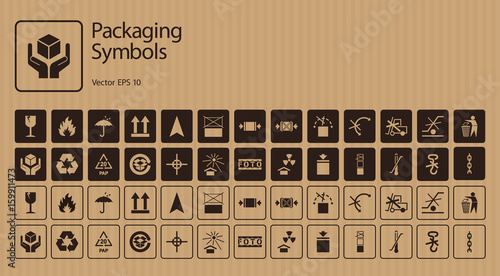 A set of packaging symbols on cardboard background photo