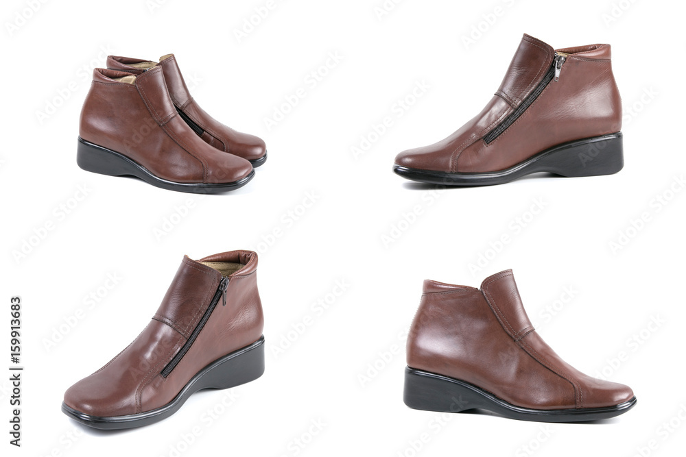 Female Brown Boot on White Background, Isolated Product, Top View, Studio. Female Brown Boot on White Background, Isolated Product, Top View, Studio.
