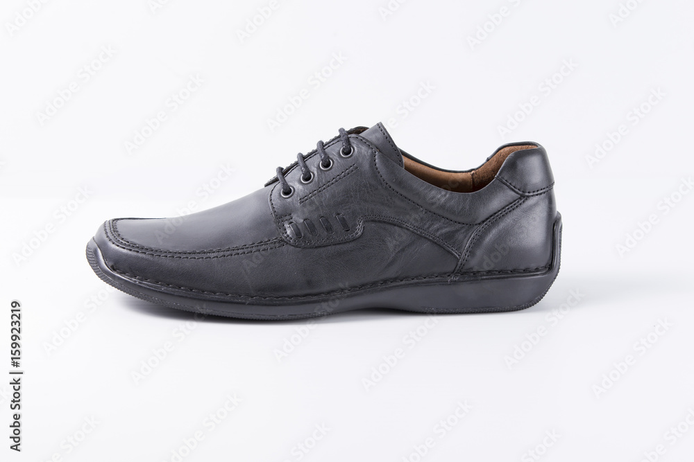 Male Black Shoe on White Background, Isolated Product, Top View, Studio. Male Black Shoe on White Background, Isolated Product, Top View, Studio.