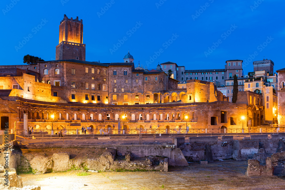 Ancient Ruins of Imperial Forum at dusk in Rome