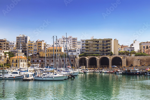 The old Venetian harbour and the Arsenal building in Heraklion, Crete, Greece. © vesta48