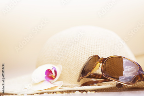 Summer vacation concept with straw hat 