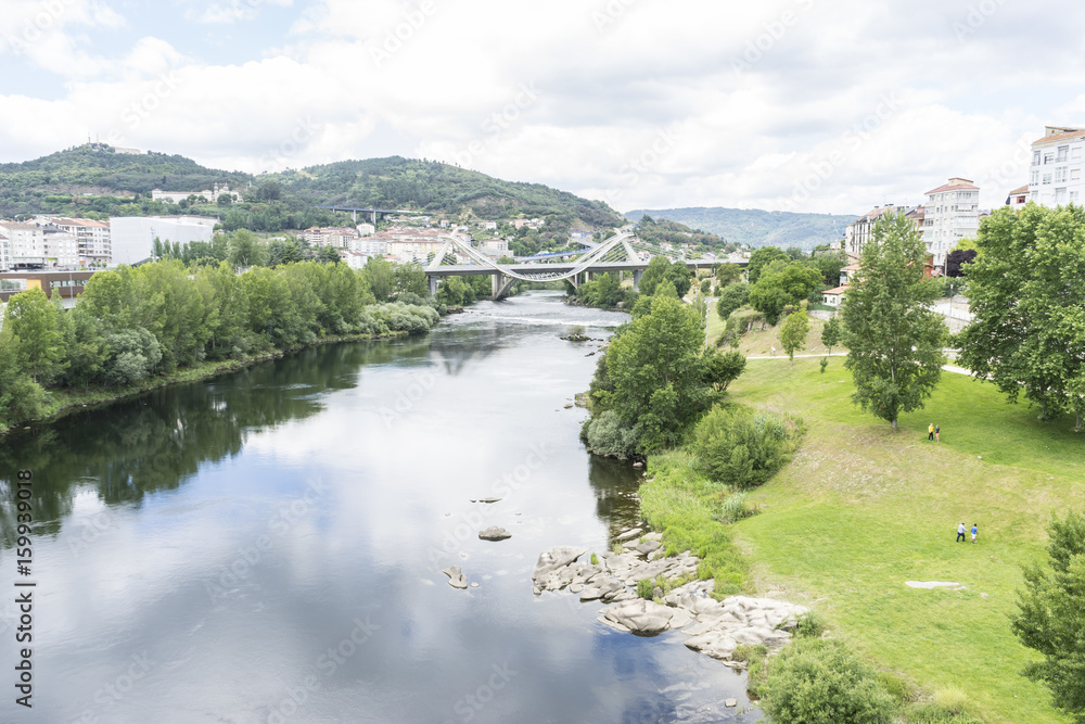 Miño river passing through Orense Roman city located in Galicia. Spain