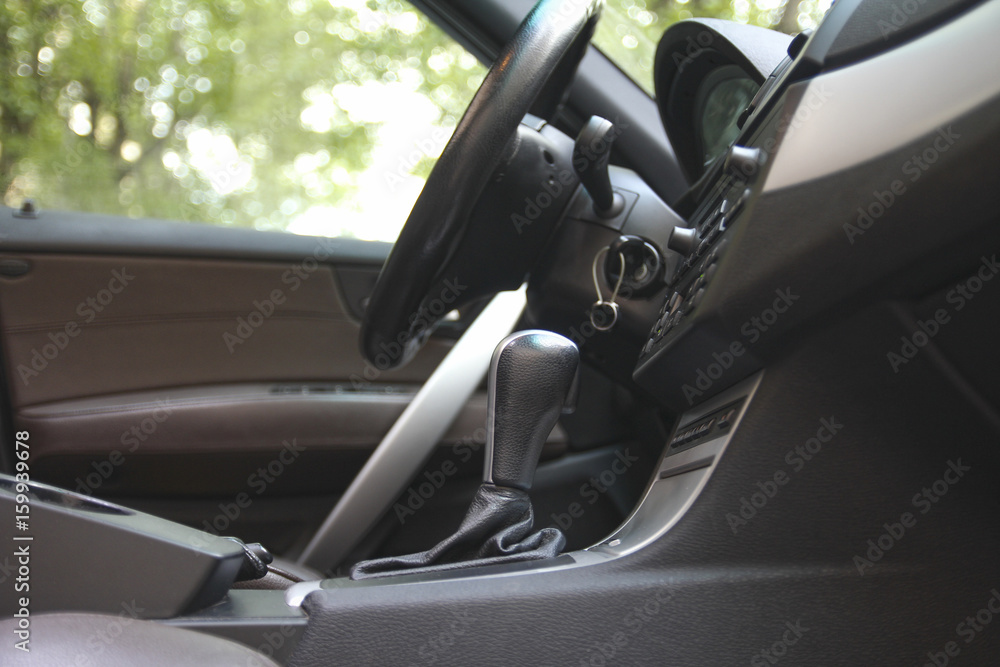 transmission and handbrake lever in a car interior