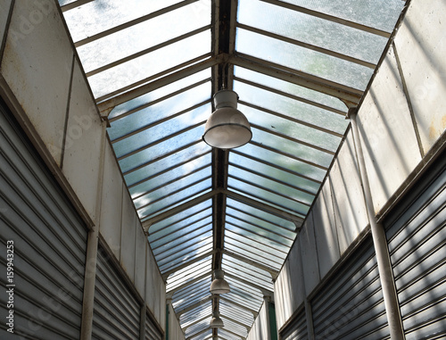 Storage with glass transparent ceiling and rolling shutter closed