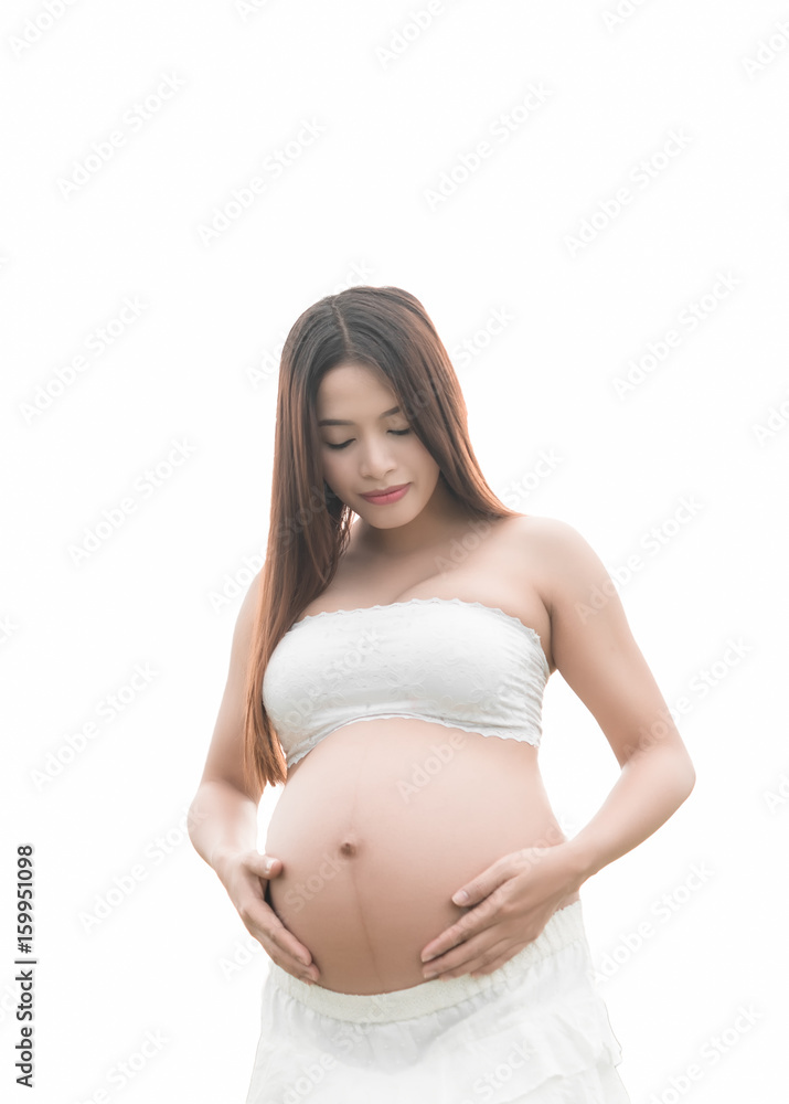 Closeup asian pregnant woman in the park,adjust color tone,thailand people Closeup asian pregnant woman in the park,adjust color tone,thailand people