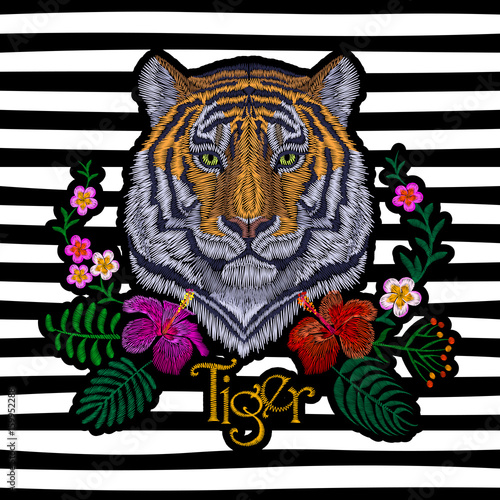 Tiger head tropic flower. Front view embroidery patch sticker. Orange striped black wild animal stitch texture textile print. Jungle logo vector illustration