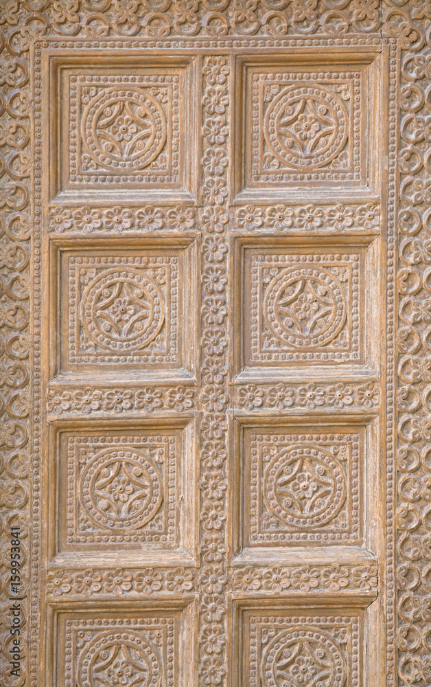 Jaisalmer, India Decoration on wall of old building Traditional stone carving