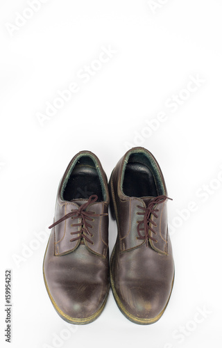 pair brown leather shoes isolated on white background , classic male shoe on white background ,close up shoes