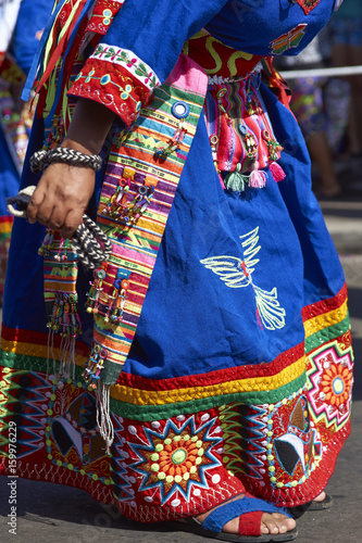 Detail of clothing worn by members of a Tinkus dancing group performing at the Carnaval Andino con la Fuerza del Sol in Arica, Chile.