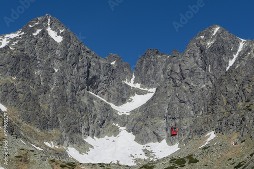 red cableway rising to the top in High Tatras